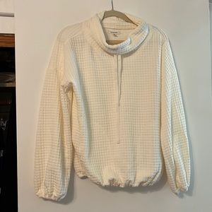 Cream colored brand new no tags pull over top by Max Studio